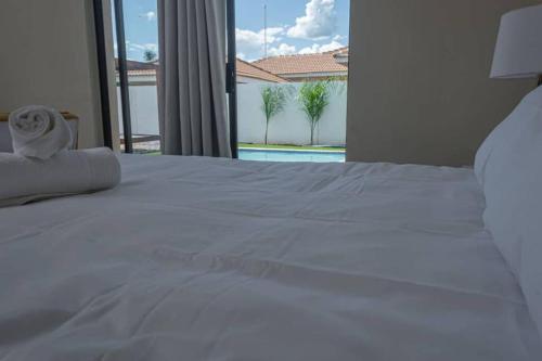 Postel nebo postele na pokoji v ubytování Ellen Topo