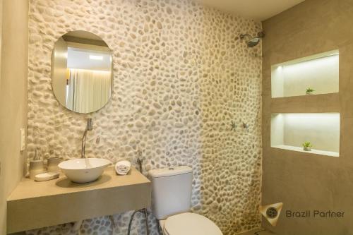 A bathroom at Taíba Beach Resort - Apartamento Encantador!