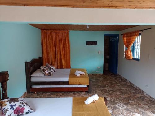 Postel nebo postele na pokoji v ubytování BRISAS DEL RIO SALENTO