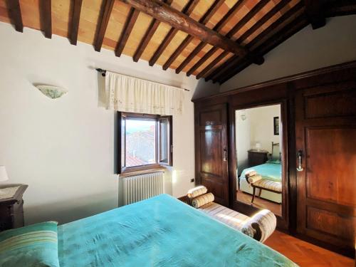 Säng eller sängar i ett rum på Casa Armandina - Tuscan ToBe