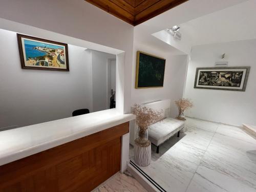 Ένα ή περισσότερα κρεβάτια σε δωμάτιο στο Hotel Búzio