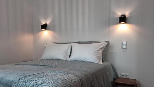 Кровать или кровати в номере Na Casa da Fátima