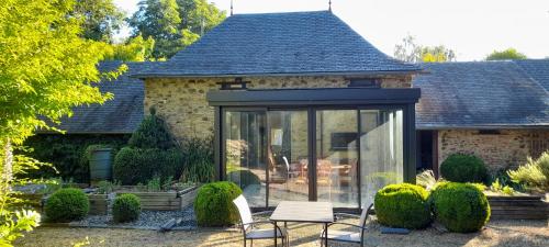 Κήπος έξω από το Domaine de Vaufleury - La Maison de l'Escuiller