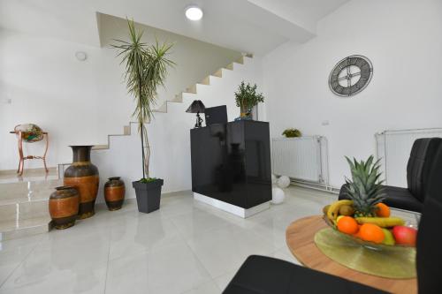 TV a/nebo společenská místnost v ubytování West in apartments