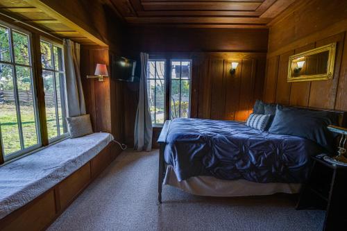 Ένα ή περισσότερα κρεβάτια σε δωμάτιο στο The Captains Quarters