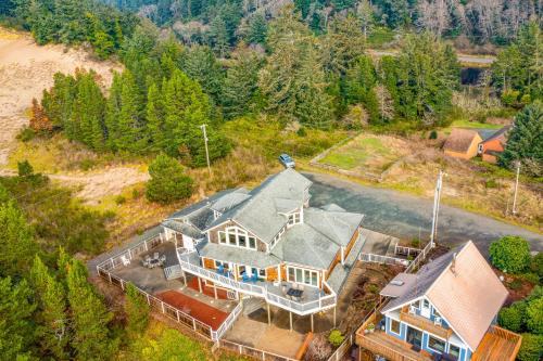 an overhead view of a large house on a hill at Anchors Aweigh in Rockaway Beach