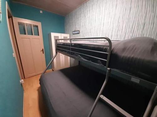 Una cama o camas en una habitación de Villa Jean gezellig appartement met zeezicht