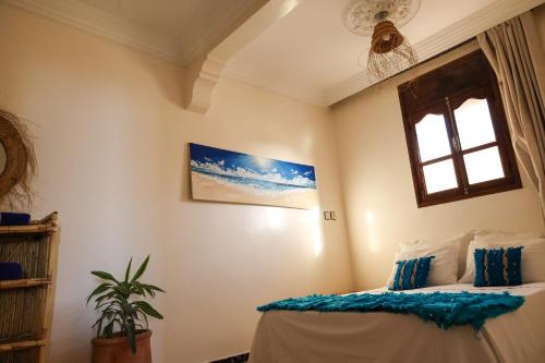 Ліжко або ліжка в номері darna surf house anza