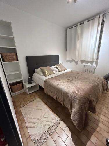 Posteľ alebo postele v izbe v ubytovaní T2 à côté de la mer quartier des Quilles