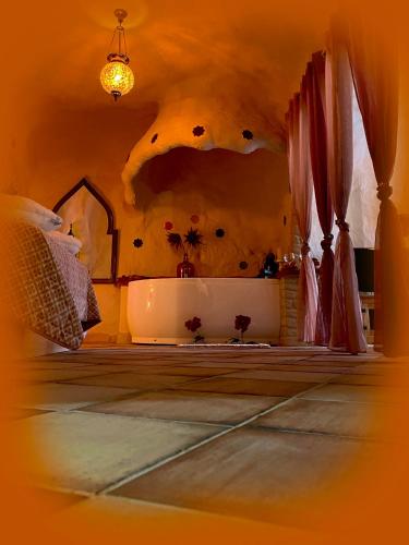 Katil atau katil-katil dalam bilik di Casas cueva El Castaño