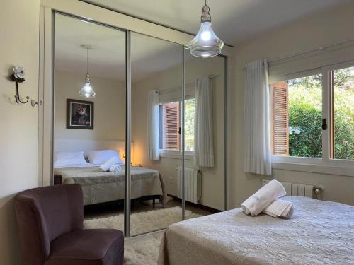 A bed or beds in a room at Apartamentos Residencial Vale Enotria by Achei Gramado