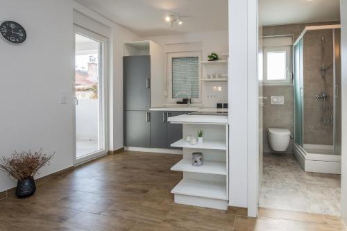 Ένα μπάνιο στο Apartments Pejakovic