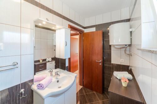 Koupelna v ubytování Apartments Hudic