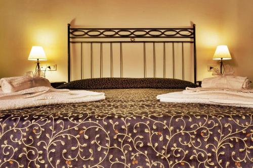 Postelja oz. postelje v sobi nastanitve Antica Cortona