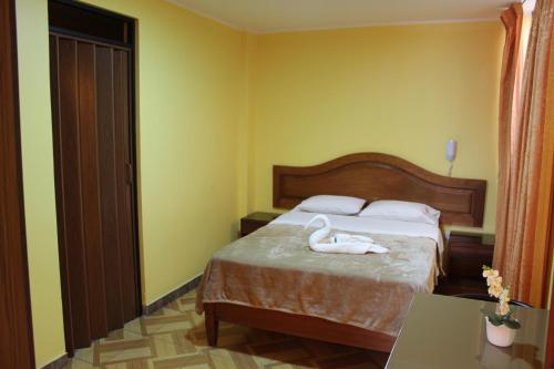 Postel nebo postele na pokoji v ubytování Hotel Caribe Azul