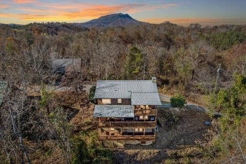 an aerial view of a house with a mountain in the background at Five-Bedroom House in Sevierville
