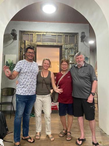 a group of people posing for a picture at HELLO VILLA & SPA in Hue