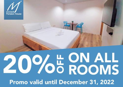 a poster for a room with a bed and a table at M LILOAN PENSION HOUSE in Catarman
