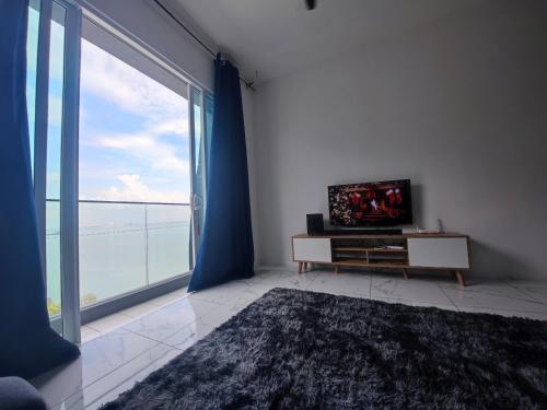 TV/Unterhaltungsangebot in der Unterkunft Infinite Seaview with Penang Bridge Suite with Sunrise up to 11 person