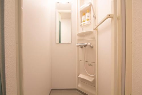 a small bathroom with a sink and a toilet at SEVEN Building / Vacation STAY 4940 in Asahikawa