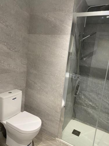 Ένα μπάνιο στο Apartamento alto standing con piscina privada, aire acondicionado y wifi