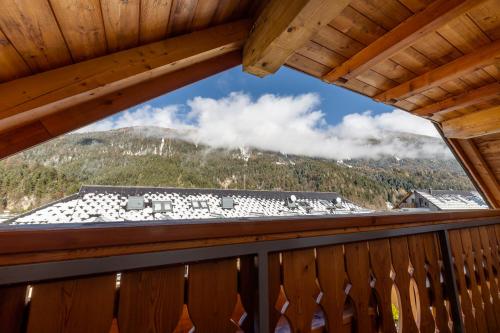 a view from the balcony of a cabin at Hotel Lipa in Kranjska Gora