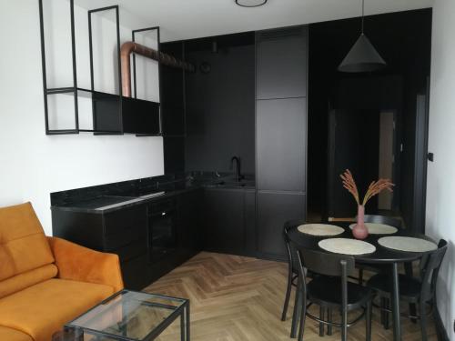 Posezení v ubytování Apartament COSY CAVE