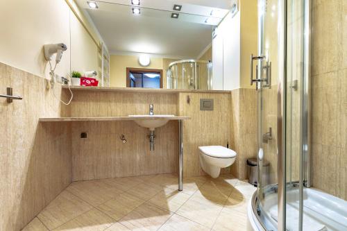 Kúpeľňa v ubytovaní VacationClub – Villa Mistral Apartament 23
