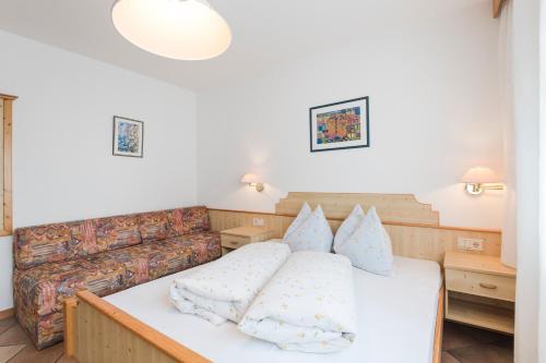 Postel nebo postele na pokoji v ubytování Residence Am Wegkreuz