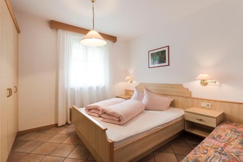 Postel nebo postele na pokoji v ubytování Residence Am Wegkreuz