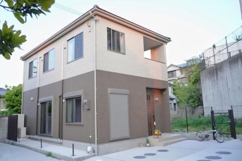 a small house with at Muji House Osaka Sannan Hotel 大阪泉南酒店良築 in Tannowa