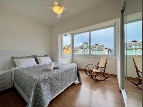 Una cama o camas en una habitación de Residenziale Fascino 2 Suítes by Achei Gramado