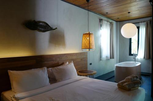 Кровать или кровати в номере Nature Beach Resort