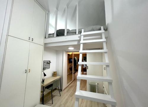a small apartment with a bunk bed in a room at Central Ground Floor Apartment in Nicosia