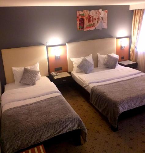 Letto o letti in una camera di ZEO HOTEL merter