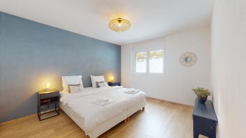 Ένα ή περισσότερα κρεβάτια σε δωμάτιο στο Sublime modern family apartment of 2 bedrooms