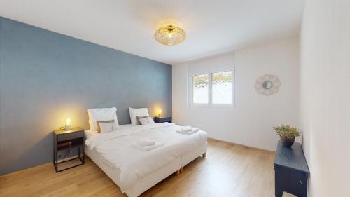 Postel nebo postele na pokoji v ubytování Sublime modern family apartment of 2 bedrooms