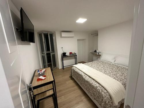 Postel nebo postele na pokoji v ubytování Raggio di Sole 2