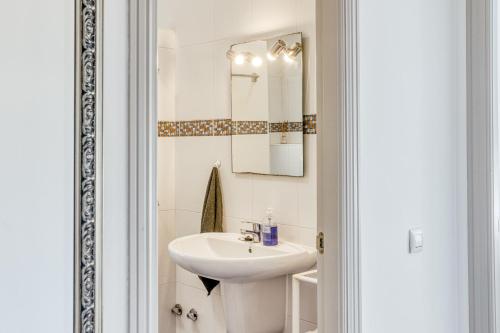 a bathroom with a sink and a mirror at La Haya in Vilacolum
