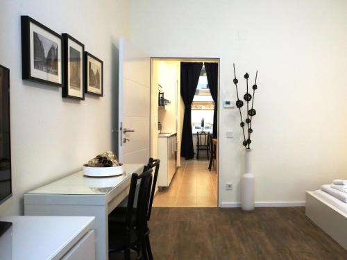 A bed or beds in a room at Flatprovider Comfort Eduard Apartment - contactless check in