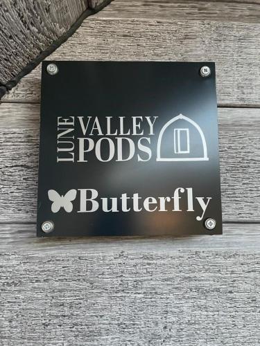 a sign for the valley protocols authority on a building at Glamping Pods in Milngavie