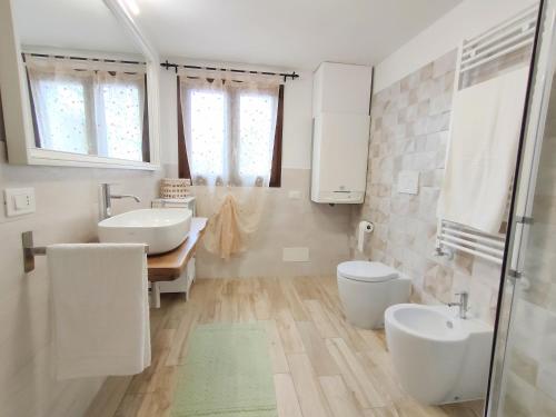 Ванная комната в Il Giardino dei Pini Affittacamere