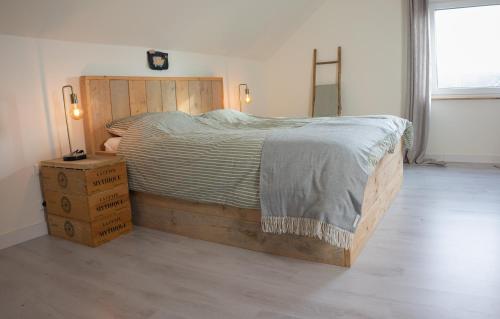 Ένα ή περισσότερα κρεβάτια σε δωμάτιο στο B&B Hieris't