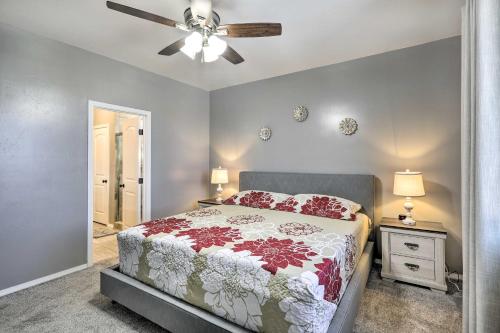 a bedroom with a bed and a ceiling fan at Bellemont Home about 12 Mi to Flagstaff! in Bellemont