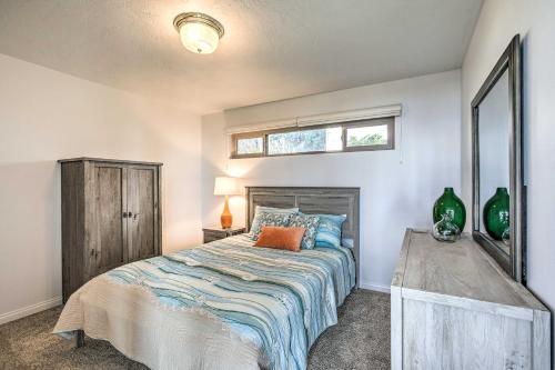 a bedroom with a bed and a window at Pet-Friendly Cayucos Home with Ocean Views! in Cayucos