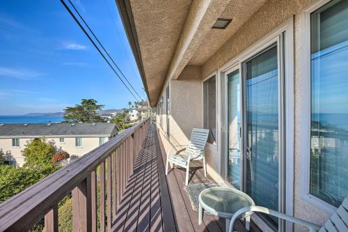 a balcony with a chair and a view of the ocean at Pet-Friendly Cayucos Home with Ocean Views! in Cayucos