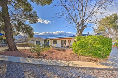 a house on a street with trees and a driveway at Pet-Friendly Gem with Treehouse 20 Mi to Sedona in Cottonwood