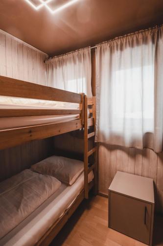 Postel nebo postele na pokoji v ubytování Residence Montani