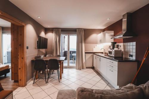 Kuchyň nebo kuchyňský kout v ubytování Residence Montani