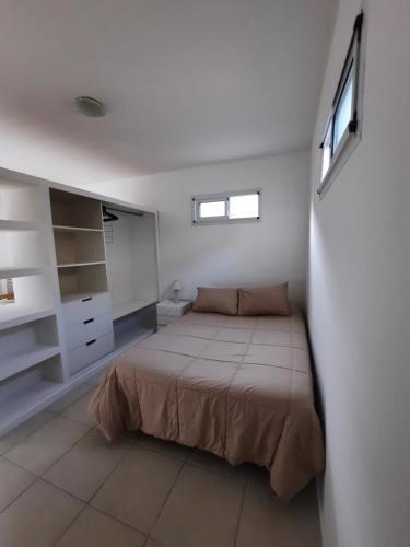 Ένα ή περισσότερα κρεβάτια σε δωμάτιο στο Apartamento Valencia